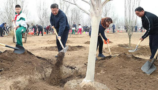 在习近平生态文明思想指引下：推进绿色发展 建设美丽中国